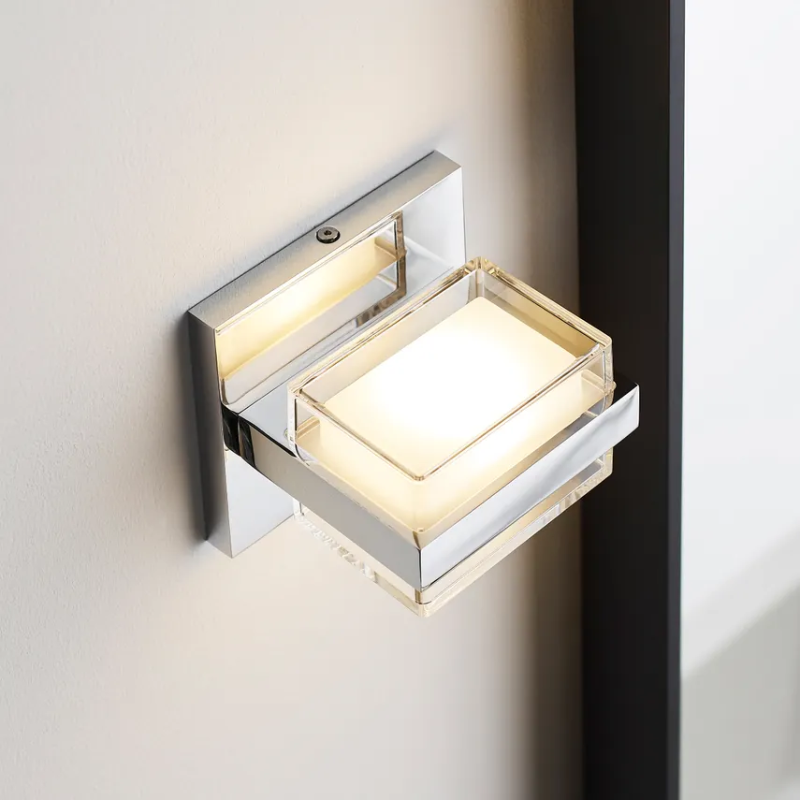 The Kamden 1-Light Bathroom Fixture from Visual Comfort & Co. in a close up shot.