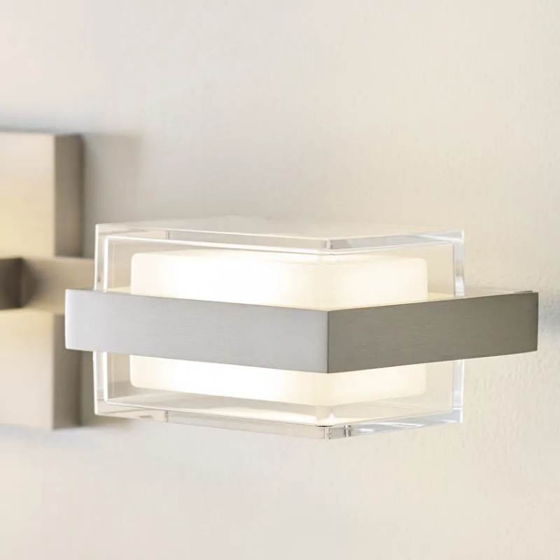 The Kamden 3-Light Bathroom Fixture from Visual Comfort & Co. in a detailed shot of the light.