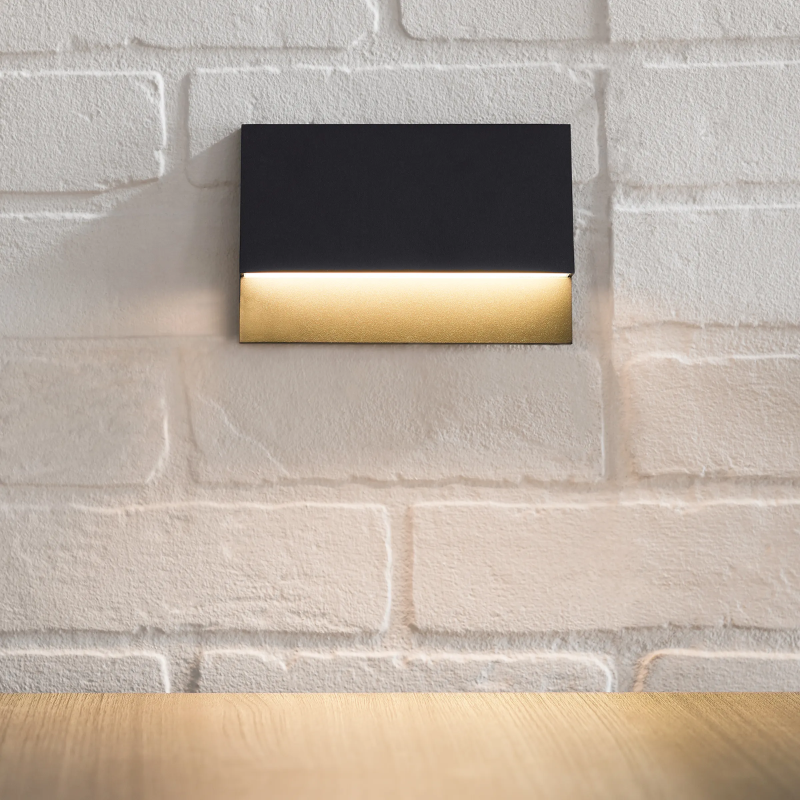 The Krysen Outdoor Step Light from Visual Comfort and Co in a hallway.
