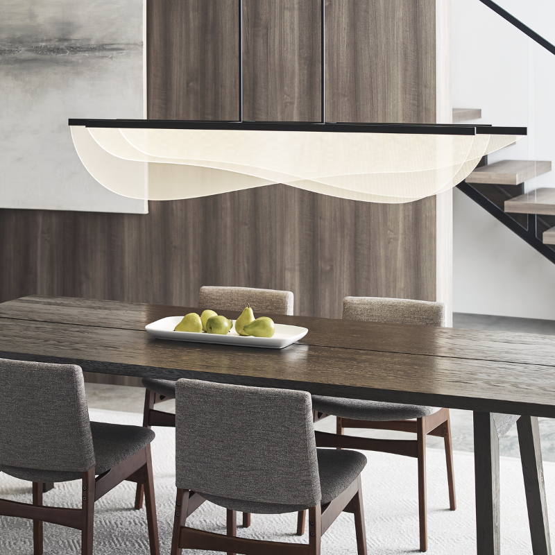 The Nyra Linear Suspension from Visual Comfort and Co in a dining room.