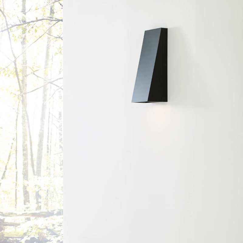 The Pitch Rectangular Outdoor Wall Sconce from Visual Comfort and Co in a home lifestyle photograph.