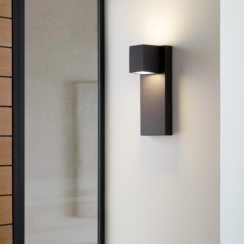 The Quadrate Outdoor Wall Sconce from Visual Comfort and Co in a living area lifestyle photograph.
