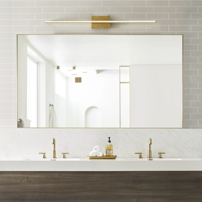 The Span Vanity Light from Visual Comfort & Co. in a bathroom with a twin sink.