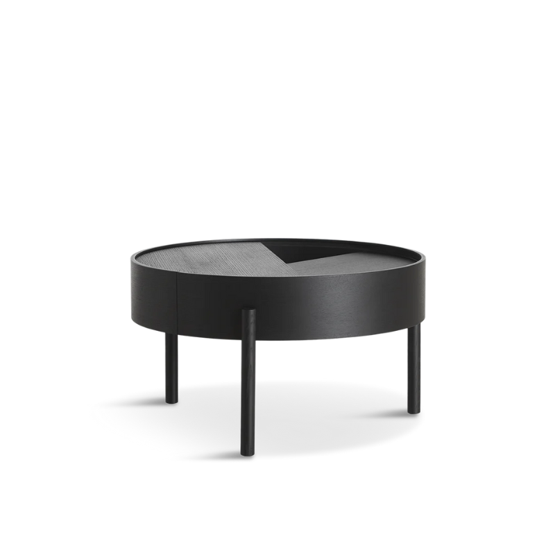 ARC takes its name from the mathematical concept of a smooth curve joining two points in a circle. The ARC table invites its user to make use of the simple functionalities, use one finger to turn the upper tabletop. Let it be open with your favorite objects on display or close the lid to hide your mess. The surface on the inside storage space is covered with a smooth nanolaminate to complement the ash wood while the three-legged construction adds a playful and light touch to the geometric shaped design.