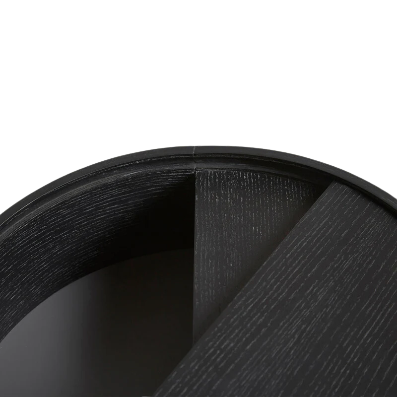 ARC takes its name from the mathematical concept of a smooth curve joining two points in a circle. The ARC table invites its user to make use of the simple functionalities, use one finger to turn the upper tabletop. Let it be open with your favorite objects on display or close the lid to hide your mess. The surface on the inside storage space is covered with a smooth nanolaminate to complement the ash wood while the three-legged construction adds a playful and light touch to the geometric shaped design.