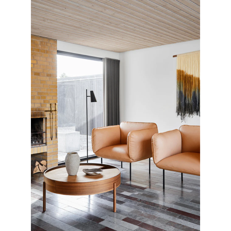 ARC takes its name from the mathematical concept of a smooth curve joining two points in a circle. The ARC table invites its user to make use of the simple functionalities, use one finger to turn the upper tabletop. Let it be open with your favorite objects on display or close the lid to hide your mess. The surface on the inside storage space is covered with a smooth nanolaminate to complement the ash wood while the three-legged construction adds a playful and light touch to the geometric shaped design.