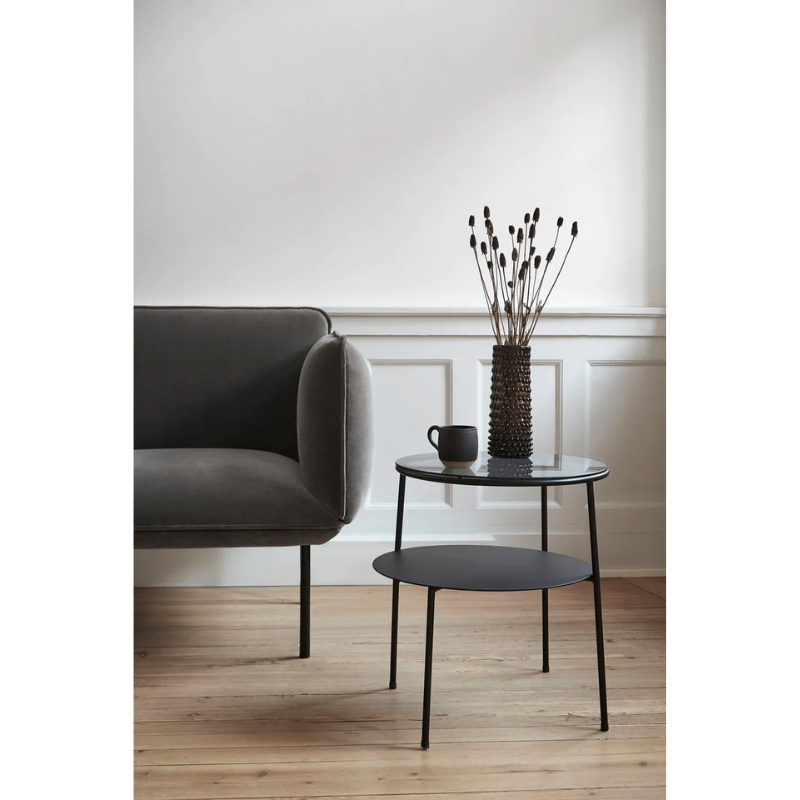 The Duo Side Table from Woud in a living room.