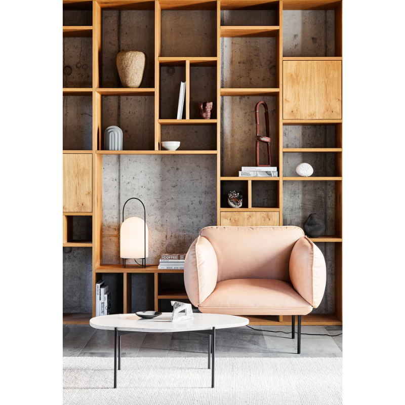 The Ivory La Terra Occasional Table from Woud in an office.