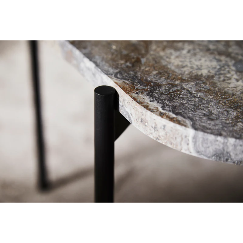 A close up on the Melange La Terra Occasional Table from Woud.