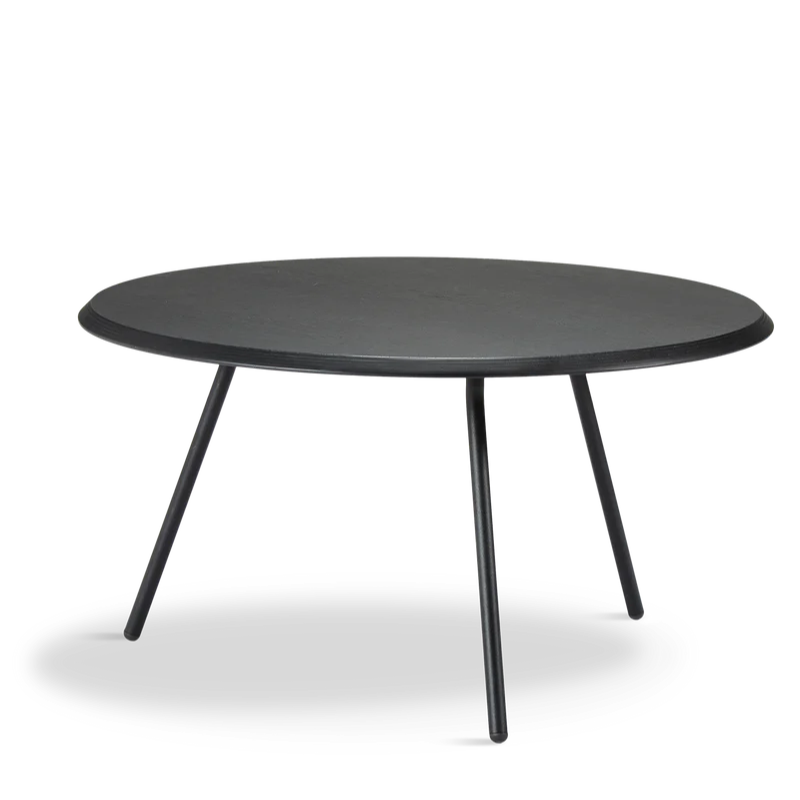 The Soround Coffee Table from Woud with the large diameter table top and low height in black ash.