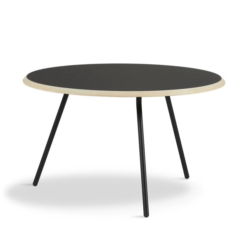 The Soround Coffee Table from Woud with the large diameter table top and medium height in black.