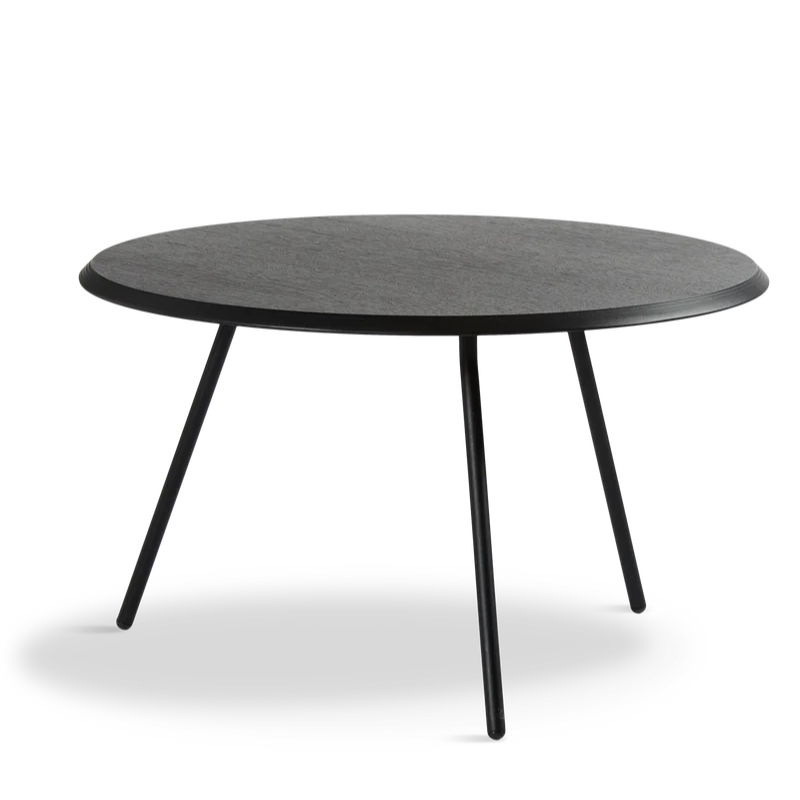 The Soround Coffee Table from Woud with the large diameter table top and medium height in black ash.