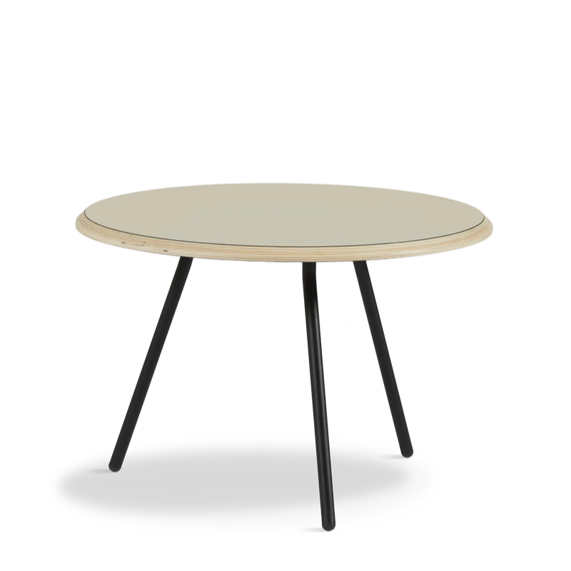 The Soround Coffee Table from Woud with the small diameter table top and low height in beige.