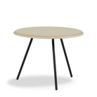 The Soround Coffee Table from Woud with the small diameter table top and medium height in beige.