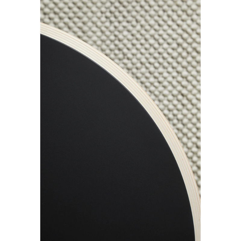 A detailed close up of the Soround Side Table table top in black.