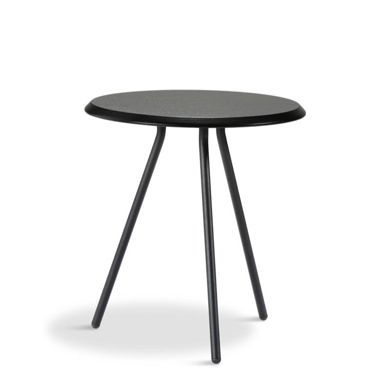 The black ash version of the Soround Side Table from Woud in the medium size.