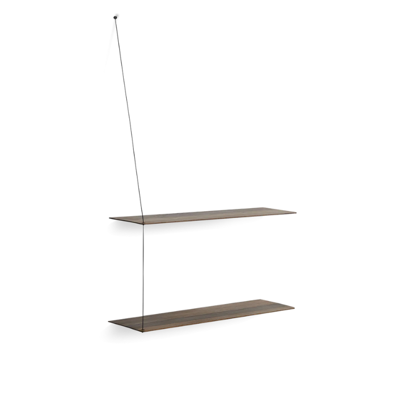 Stedge is all about lightness, purism and a clear structure. The subtle design is an optical illusion as the solid shelves seem to hang by a thread. With its light expression and fine edges, Stedge will be a perfect match for any room. Extend the shelving system with more shelves and choose either a long or short top wire to make it a perfect fit on your wall. Available in two widths.