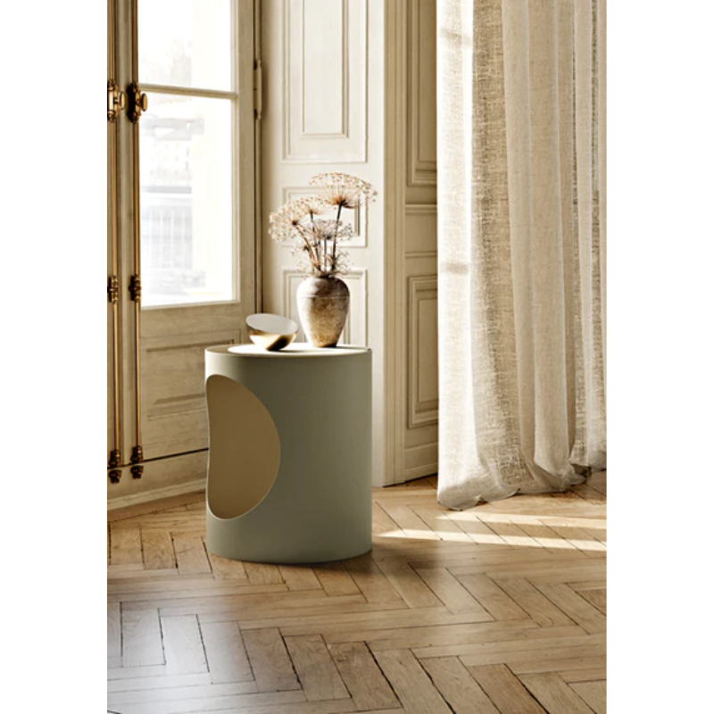 The TABL Side Table from Woud in a living room lifestyle shot, showing off the versatility of the table.
