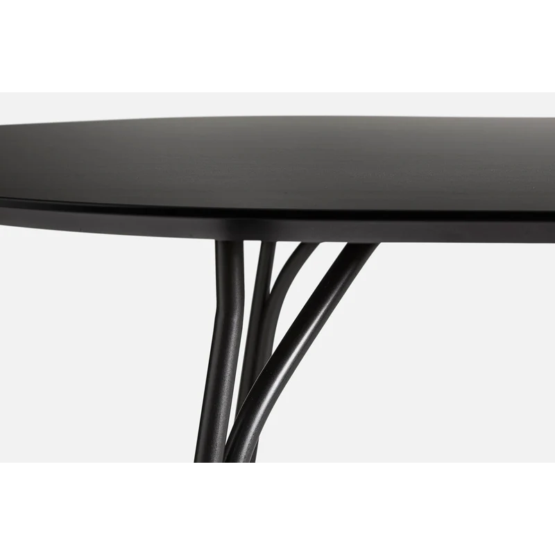 A close up on a Tree Dining Table from Woud in black.