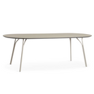 A large Tree Dining Table from Woud in beige.