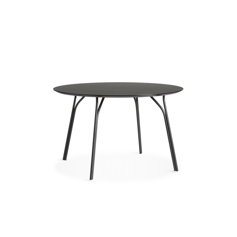 A medium Tree Dining Table from Woud in black.