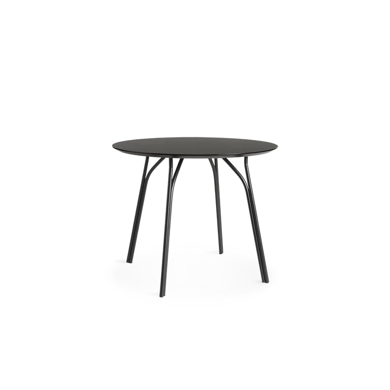 A small Tree Dining Table from Woud in black.