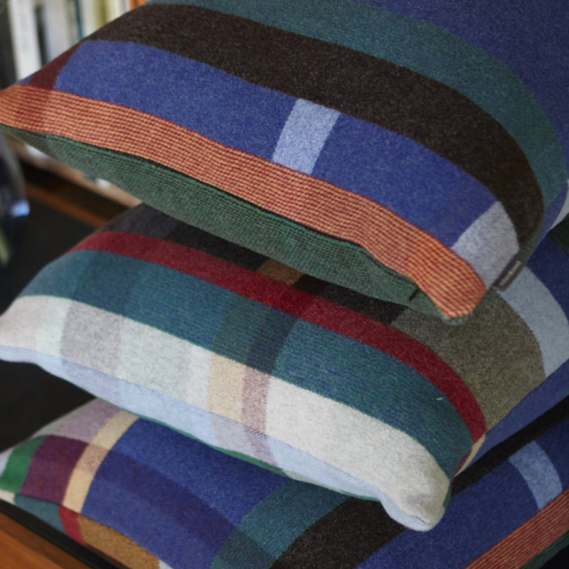 The Antoni Cushion from Wallace & Sewell's Block Cushion Collection is a stunning pop of color for any space. Inspired by Korean artist Chung Eun Mo's abstract paintings, this luxurious cushion features a bold checkerboard pattern of juxtaposed blocks and striking hues. Made from sumptuous merino lambswool this throw pillow is reversible with a different colorway on each side for versatile use. 