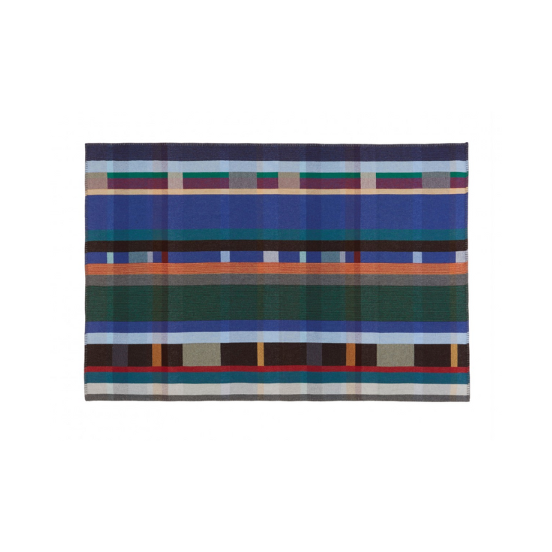 The Antoni Throw from the Wallace & Sewell Block Throw Collection is inspired by Korean artist, Chung Eun Mo's abstract paintings. This stunning throw features a bold checkerboard pattern of juxtaposed blocks and striking hues. Made from sumptuous merino lambswool and finished with blanket stitches for added elegance, the Antoni Throw is reversible with a different colorway on each side. 