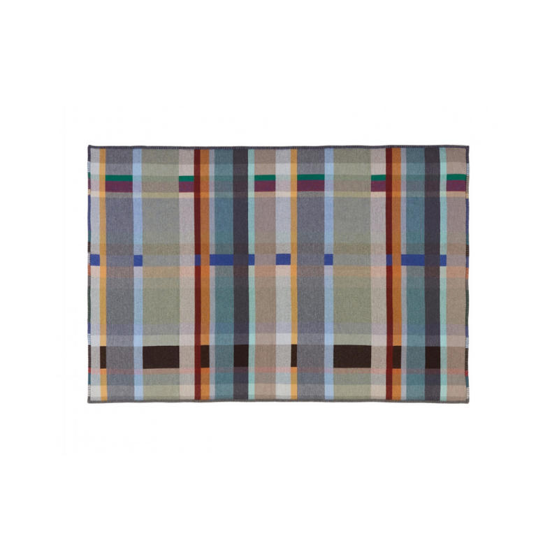 The Antoni Throw from the Wallace & Sewell Block Throw Collection is inspired by Korean artist, Chung Eun Mo's abstract paintings. This stunning throw features a bold checkerboard pattern of juxtaposed blocks and striking hues. Made from sumptuous merino lambswool and finished with blanket stitches for added elegance, the Antoni Throw is reversible with a different colorway on each side. 