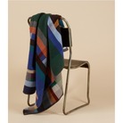 The Antoni Throw from the Wallace & Sewell Block Throw Collection is inspired by Korean artist, Chung Eun Mo's abstract paintings. This stunning throw features a bold checkerboard pattern of juxtaposed blocks and striking hues. Made from sumptuous merino lambswool and finished with blanket stitches for added elegance, the Antoni Throw is reversible with a different colorway on each side. 