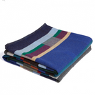 The Antoni Throw from the Wallace & Sewell Block Throw Collection is inspired by Korean artist, Chung Eun Mo's abstract paintings. This stunning throw features a bold checkerboard pattern of juxtaposed blocks and striking hues. Made from sumptuous merino lambswool and finished with blanket stitches for added elegance, the Antoni Throw is reversible with a different colorway on each side. 