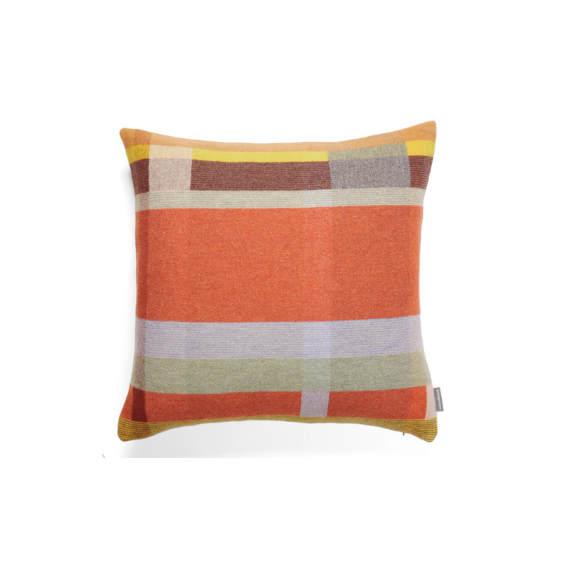 The luxurious Cecil Cushion from the Wallace & Sewell Block Collection is inspired by Korean artist, Chung Eun Mo's abstract paintings. This stunning throw pillow features a bold checkerboard pattern of juxtaposed blocks and striking hues. Made from sumptuous merino lambswool, this cushion is reversible with a different colorway on each side. 