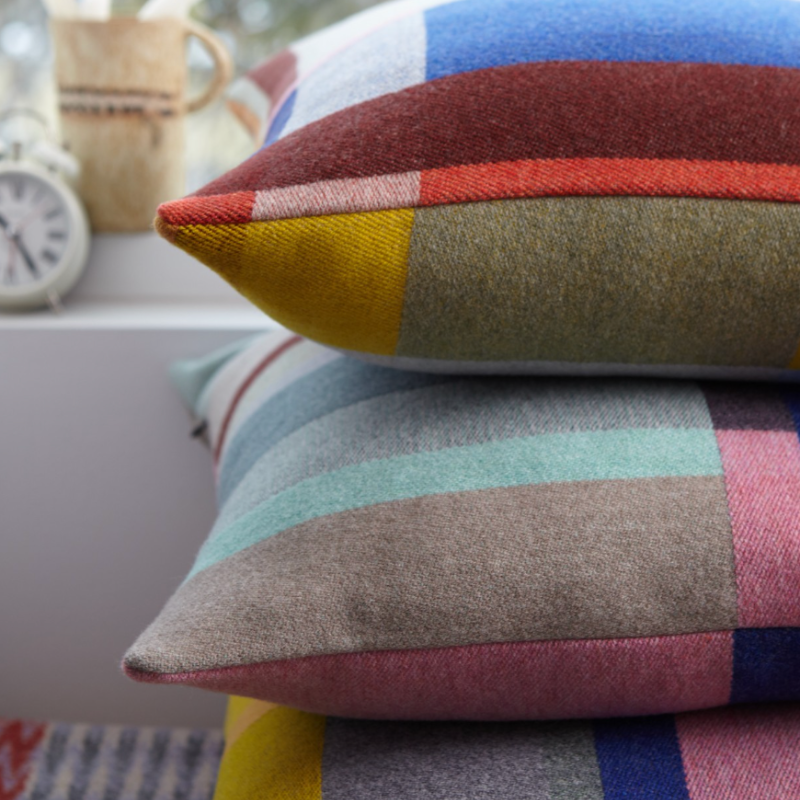 The Lloyd Cushion from Wallace & Sewell's Block Cushion Collection is a stunning pop of color for any space. Inspired by Korean artist Chung Eun Mo's abstract paintings, this luxurious cushion features a bold checkerboard pattern of juxtaposed blocks and striking hues. Made from sumptuous merino lambswool this throw pillow is reversible with a different colorway on each side for versatile use. 