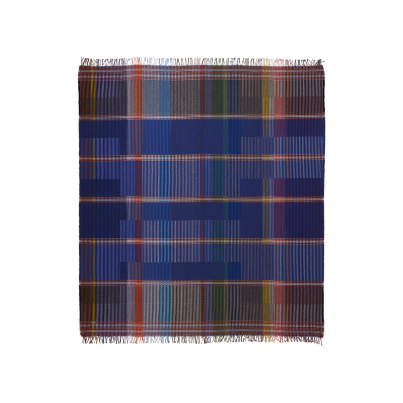 The Calvert Throw by Wallace & Sewell is made of woven merino lambswool. The Pinstripe collection combines bold-colored blocks with fine, detailed vertical stripes. This double-sided design also has a contrasting pixelated border and is a stunning room addition. Materials: 100% merino lambswool, from Australia and South Africa. Dyed and spun in Yorkshire, UK. Fabric is woven in Lancashire, UK. 