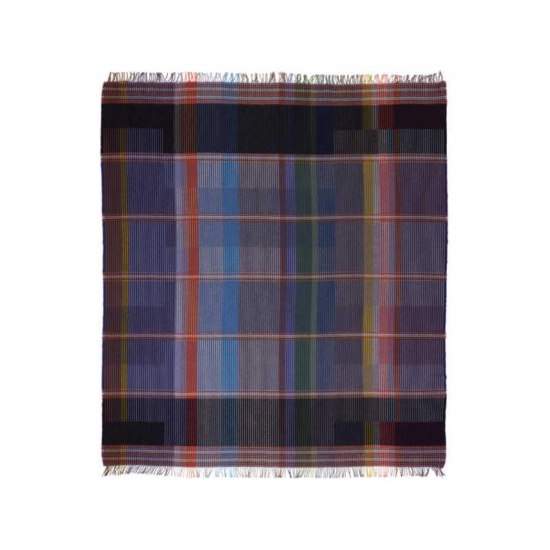 The Calvert Throw by Wallace & Sewell is made of woven merino lambswool. The Pinstripe collection combines bold-colored blocks with fine, detailed vertical stripes. This double-sided design also has a contrasting pixelated border and is a stunning room addition. Materials: 100% merino lambswool, from Australia and South Africa. Dyed and spun in Yorkshire, UK. Fabric is woven in Lancashire, UK. 