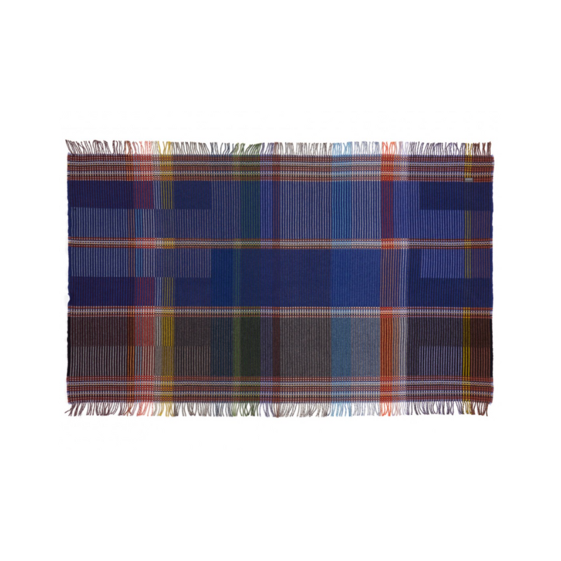 The Calvert Throw by Wallace & Sewell is made of woven merino lambswool. The Pinstripe collection combines bold-colored blocks with fine, detailed vertical stripes. This double-sided design also has a contrasting pixelated border and is a stunning room addition. Materials: 100% merino lambswool, from Australia and South Africa. Dyed and spun in Yorkshire, UK. Fabric is woven in Lancashire, UK. 
