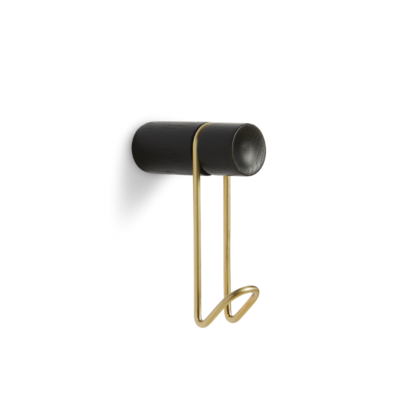 The Around Wall Hanger (Small) from Woud in black with the satin brass hook.