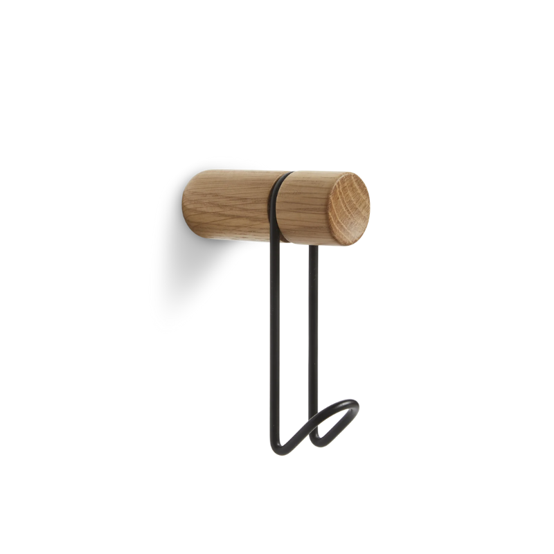 The Around Wall Hanger (Small) from Woud in oak with the black hook.