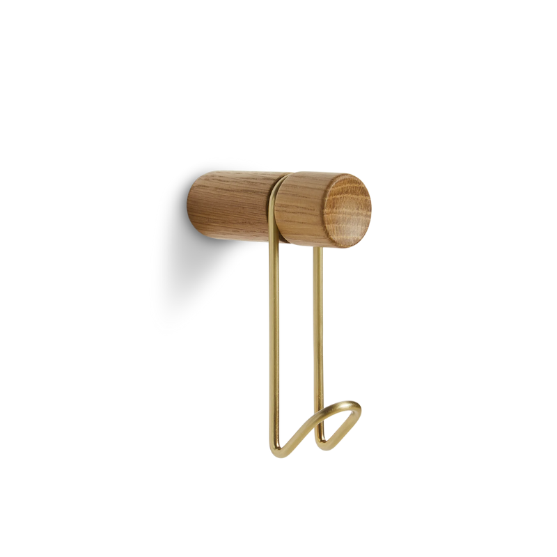The Around Wall Hanger (Small) from Woud in oak with the satin brass hook.