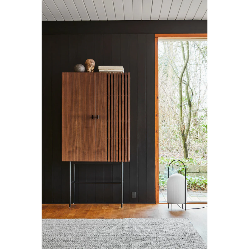 The Array Highboard from Woud in walnut, closed.