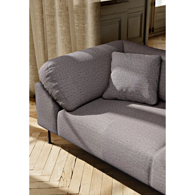The Collar 2.5 Seater from Woud in a lifestyle photograph showing the upholstery.