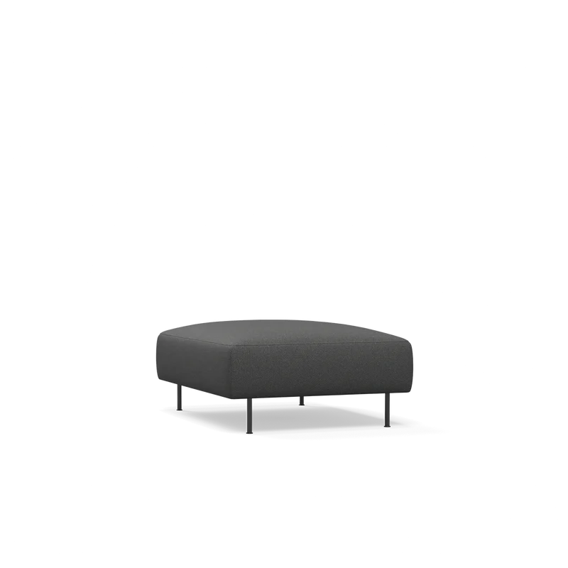 The Collar Ottoman from Woud in dark grey.