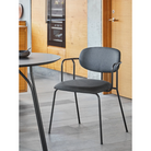 The Frame Dining Chair from Woud in a lifestyle close up photograph.