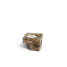 A photograph of the solid marble Jeu De Dés 2 Candle Holder by Woud in brown.