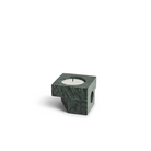 A photograph of the solid marble Jeu De Dés 2 Candle Holder by Woud in green.