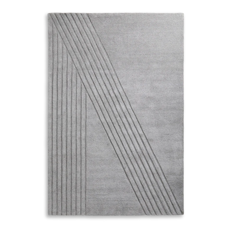 The Kyoto Rug by Woud which consists of 80% wool and 20% cotton. This is the grey color in 200 x 300 (cm) size.
