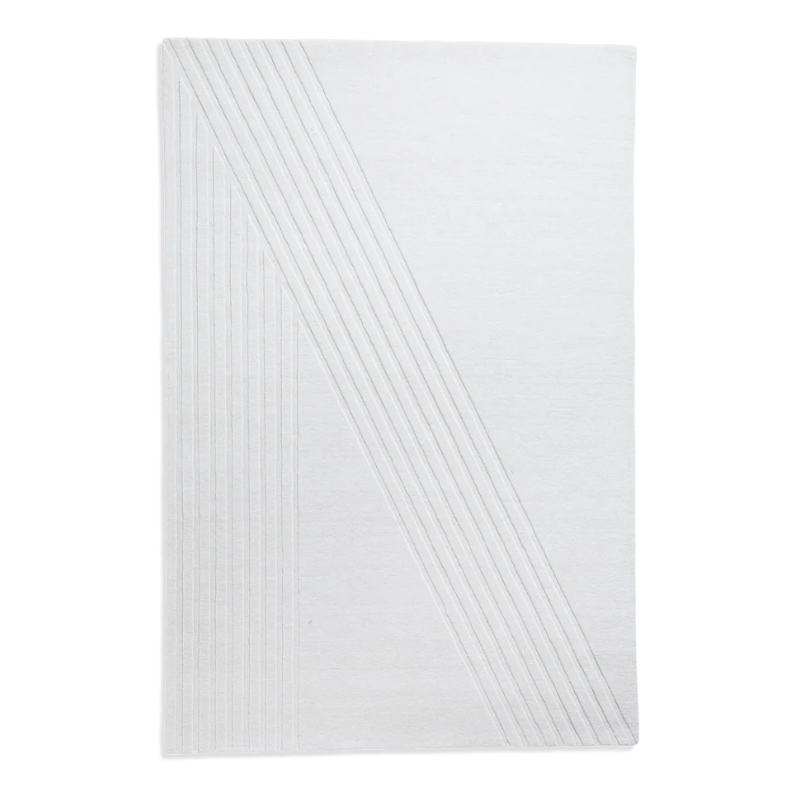 The Kyoto Rug by Woud which consists of 80% wool and 20% cotton. This is the off white color in 200 x 300 (cm) size.