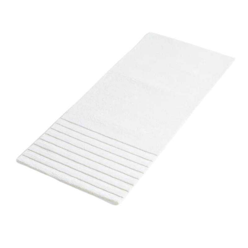 The Kyoto Rug by Woud which consists of 80% wool and 20% cotton. This is the off white color in 200 x 80 (cm) size from a side angle.