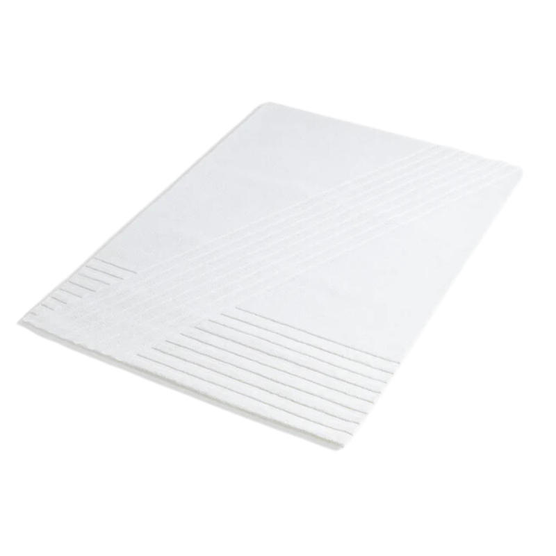 The Kyoto Rug by Woud which consists of 80% wool and 20% cotton. This is the off white color in 240 x 170 (cm) size from a side angle.