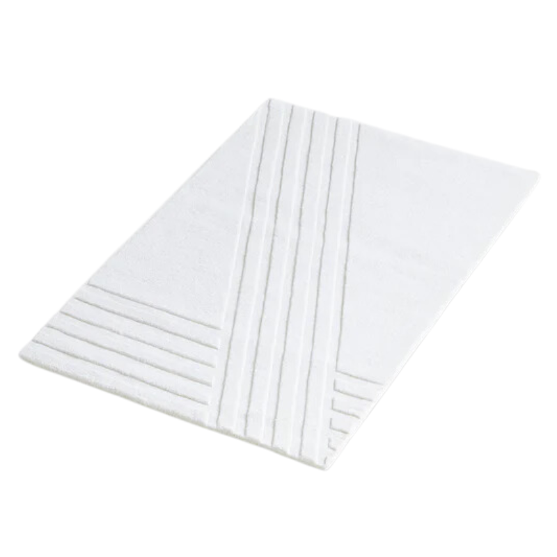 The Kyoto Rug by Woud which consists of 80% wool and 20% cotton. This is the off white color in 90 x 140 (cm) size from a side angle.